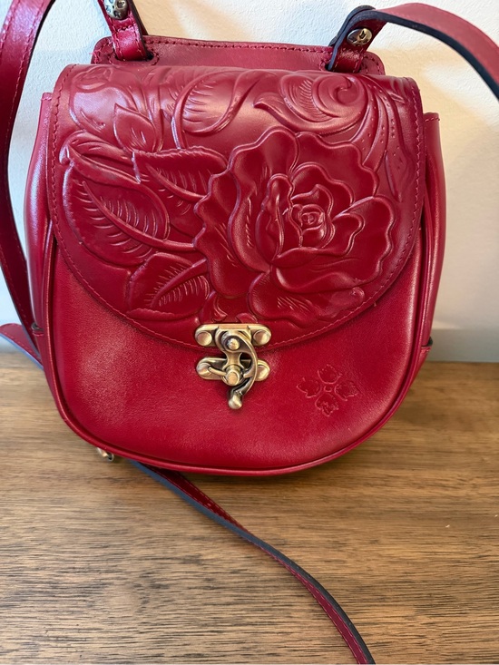 Patricia Nash Handbags - Patricia Nash Ruby Red Rose Embossed Leather Saddle Crossbody Bag Floral